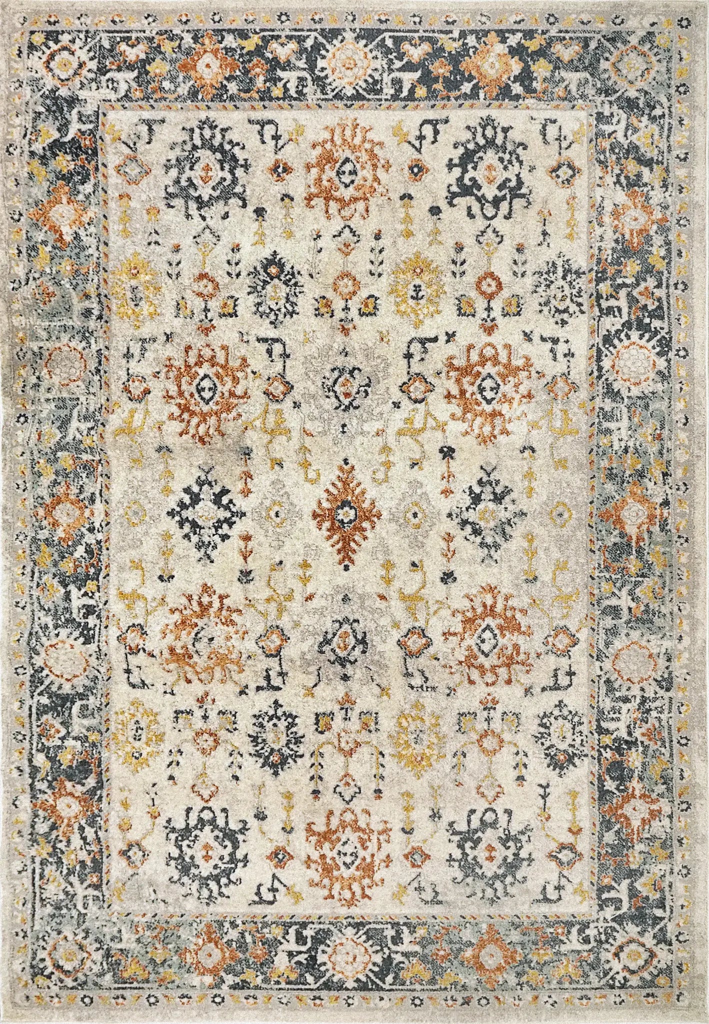 A Zahara rectangular traditional wool rug with a floral pattern in shades of beige, brown, gold, and gray.